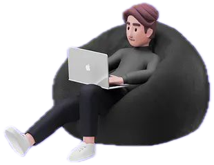 Person working on a laptop in a beanbag